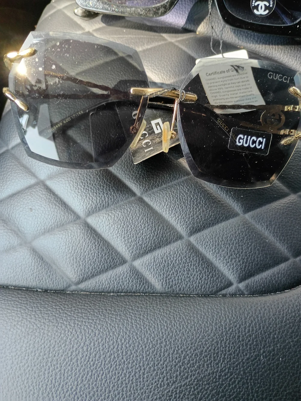 Gucci Men’s Black Lensed Sunglasses with Gold Trim